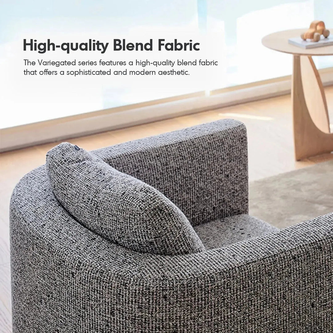 Minimalist fabric 1 seater revolving sofa variegated with context.