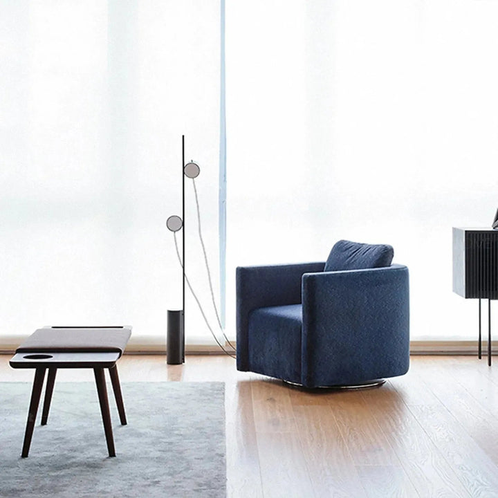Minimalist fabric 1 seater revolving sofa variegated layered structure.