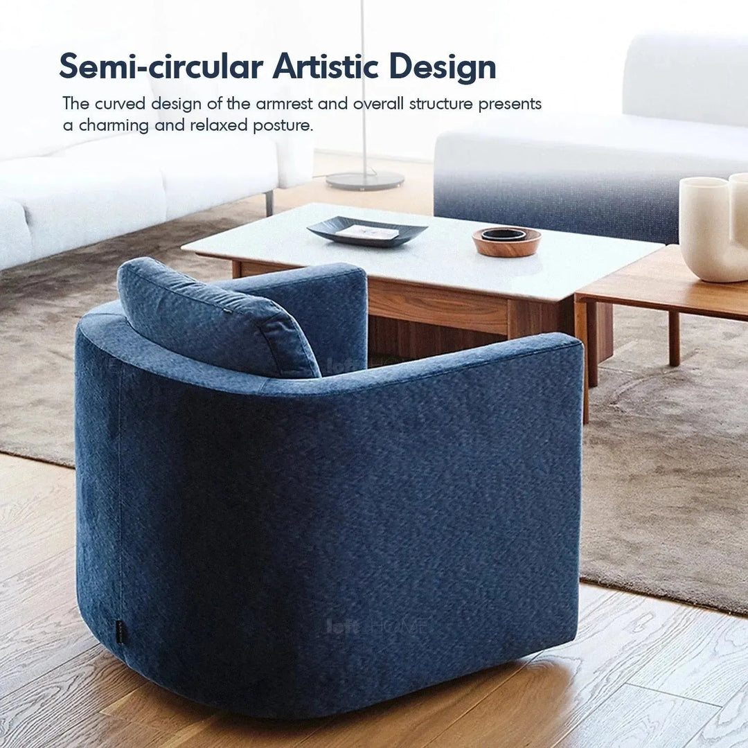 Minimalist fabric 1 seater revolving sofa variegated in close up details.