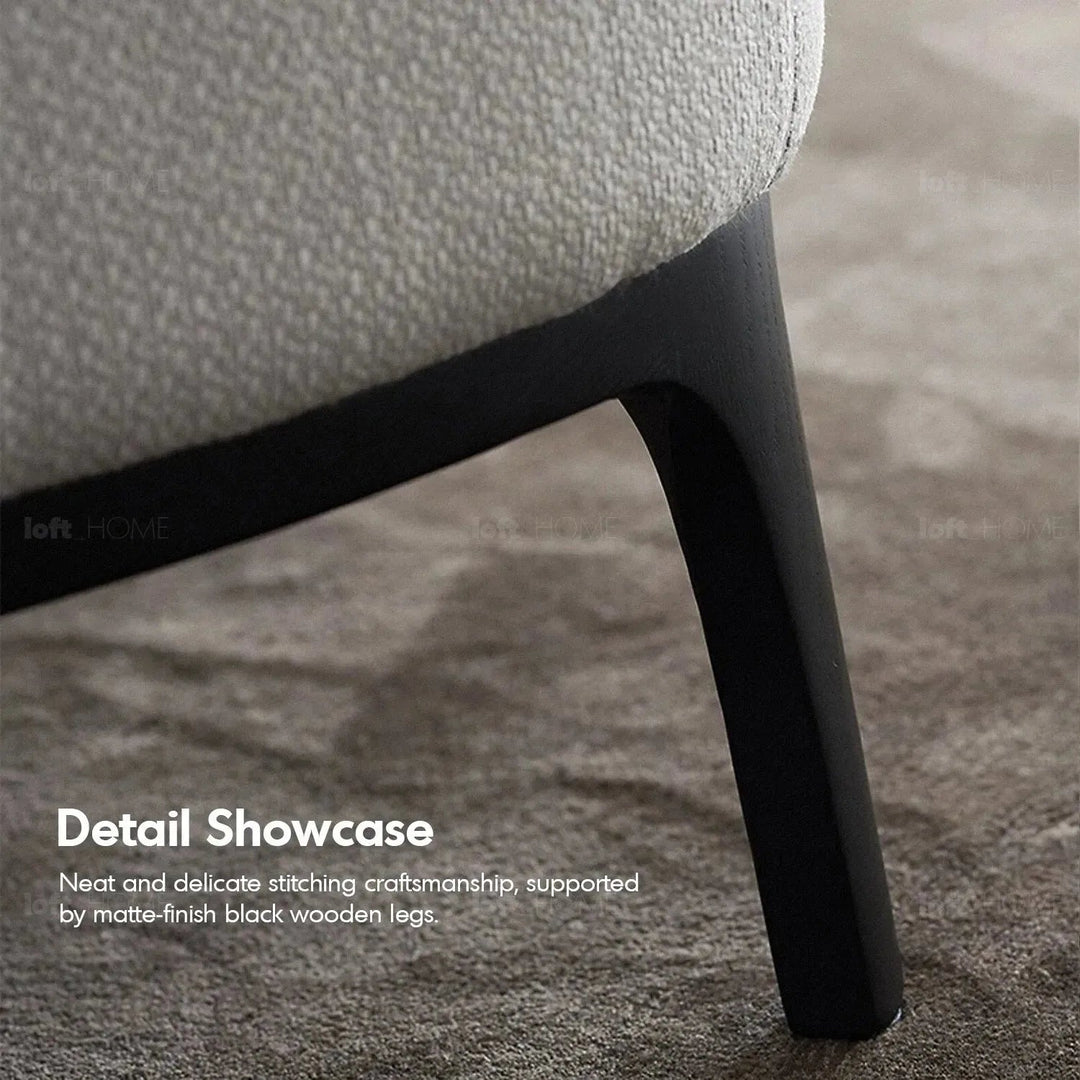 Minimalist fabric 1 seater sofa rina in close up details.