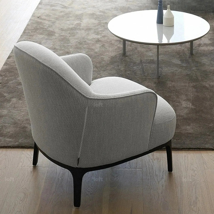 Minimalist fabric 1 seater sofa rina in panoramic view.