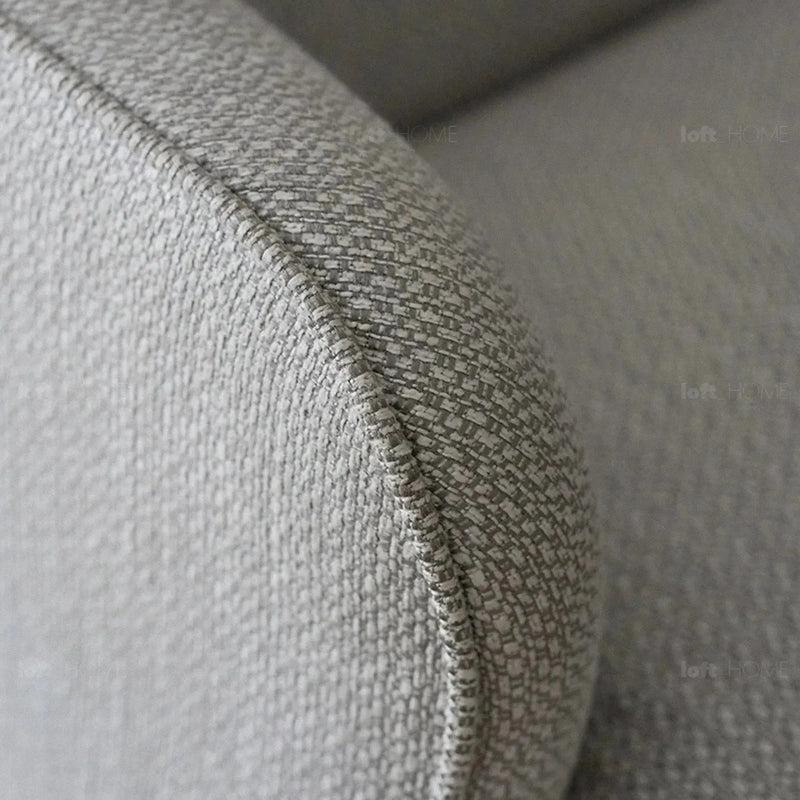 Minimalist fabric 1 seater sofa rina in still life.