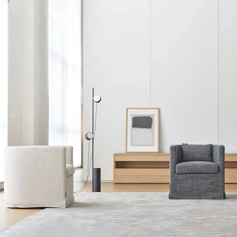 Minimalist fabric 1 seater sofa yan in close up details.