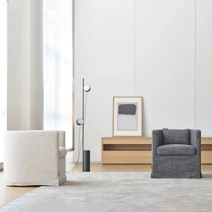 Minimalist fabric 1 seater sofa yan in close up details.
