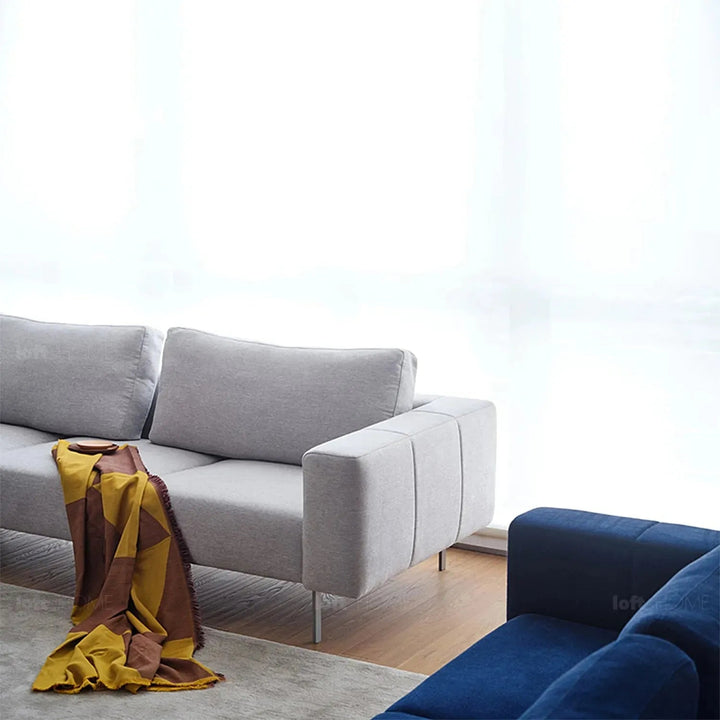 Minimalist fabric 3 seater sofa amalf in close up details.