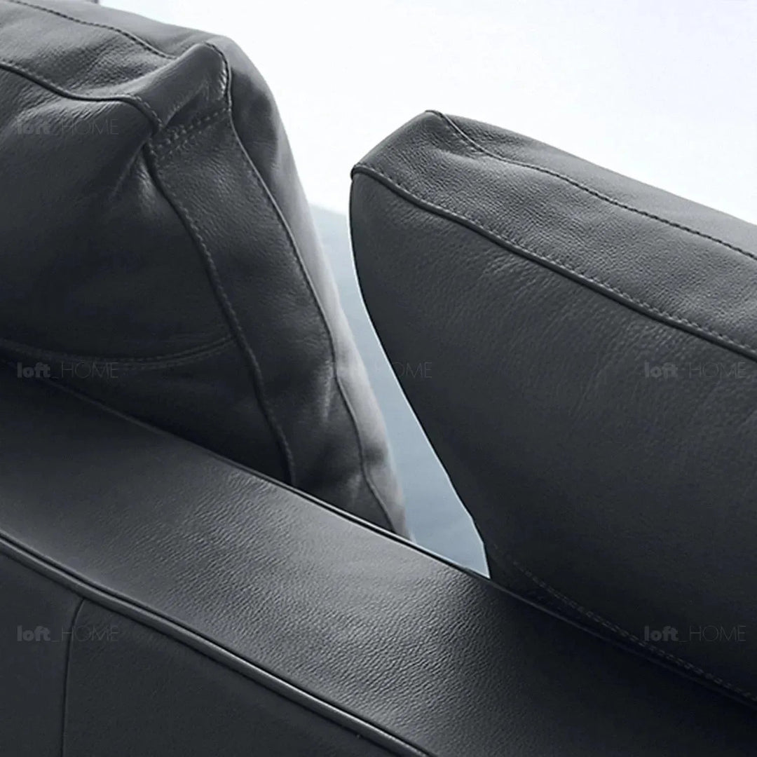 Minimalist fabric 3 seater sofa como in still life.