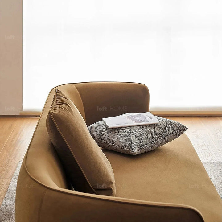 Minimalist fabric 3 seater sofa heb in still life.