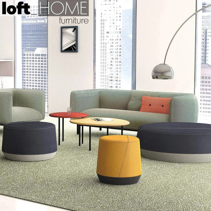 Minimalist fabric 3 seater sofa mello with context.