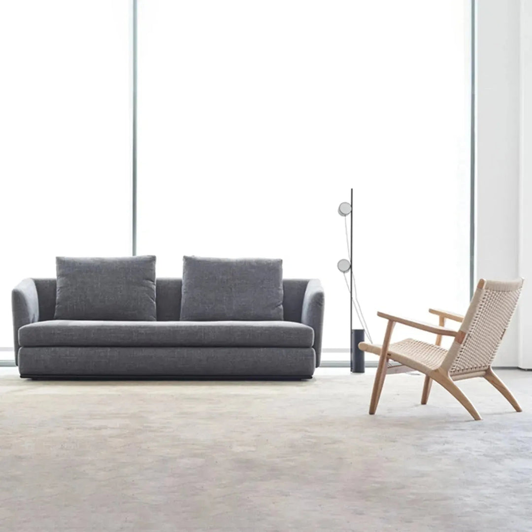 Minimalist fabric 3 seater sofa mlini in still life.