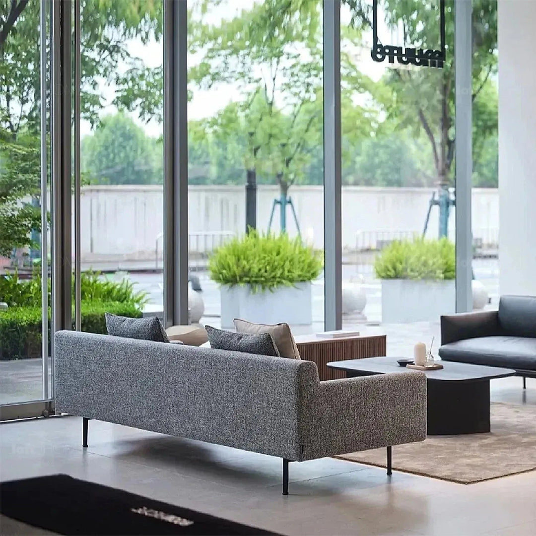 Minimalist fabric 3 seater sofa nor situational feels.