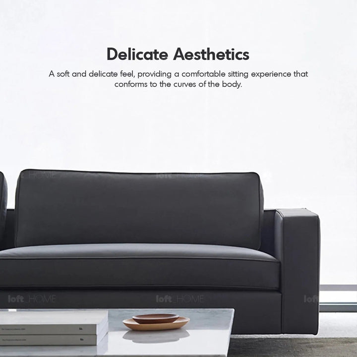 Minimalist fabric 3 seater sofa vemb with context.