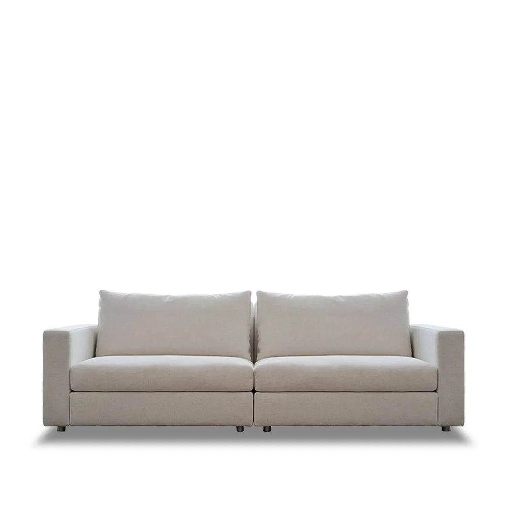 Minimalist fabric 3 seater sofa white in white background.