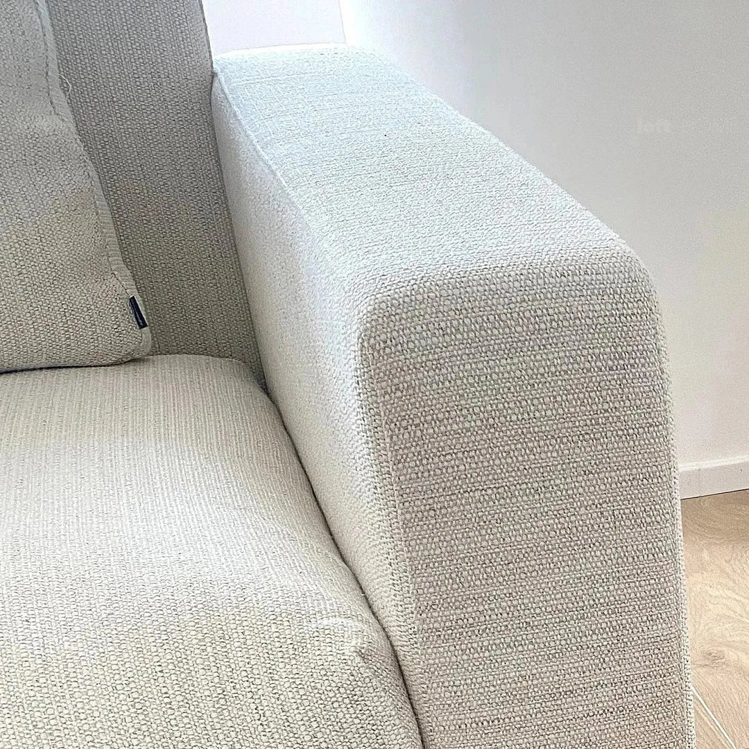 Minimalist fabric 3 seater sofa white in details.