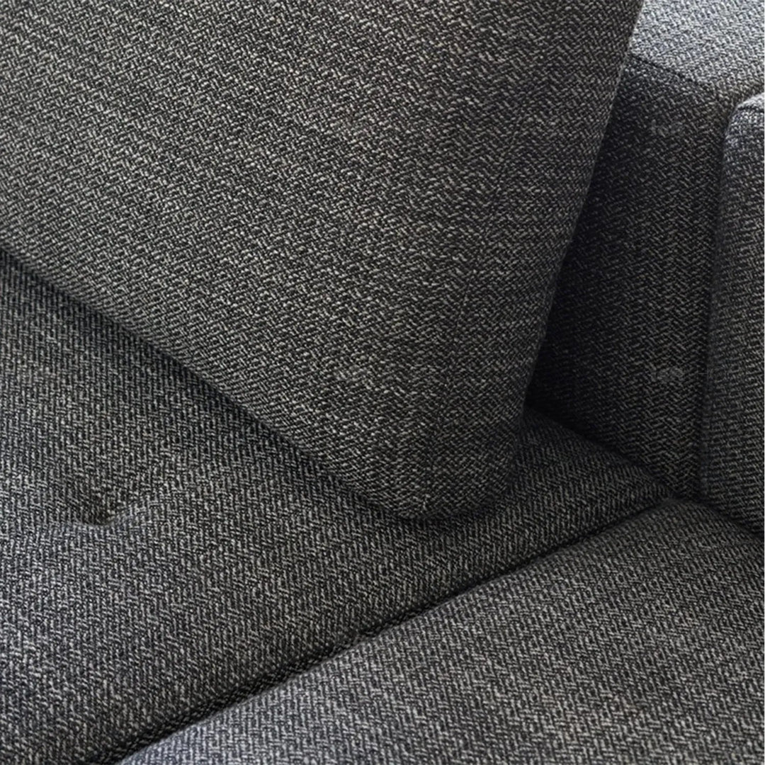 Minimalist fabric 3.5 seater sofa bri in panoramic view.