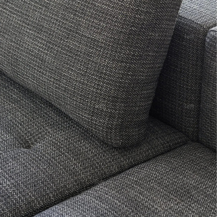 Minimalist fabric 3.5 seater sofa bri in panoramic view.