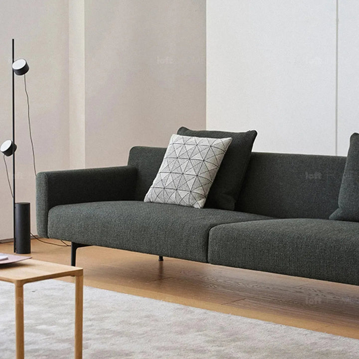 Minimalist fabric 4 seater sofa ann layered structure.