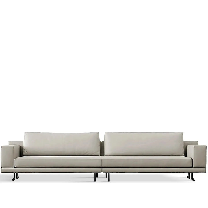 Minimalist fabric 4 seater sofa bologna in white background.