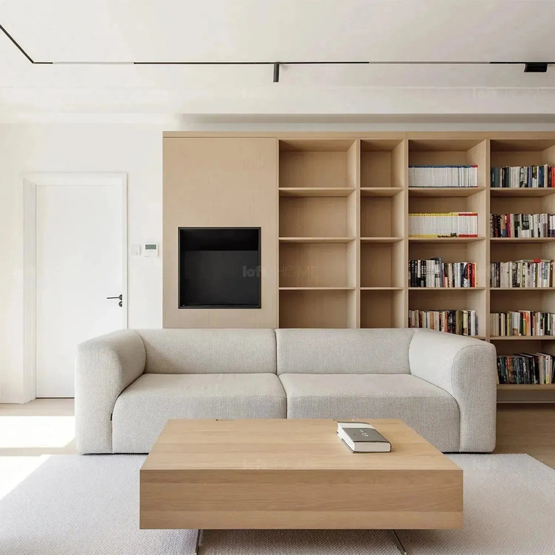 Minimalist fabric 4 seater sofa flower with context.