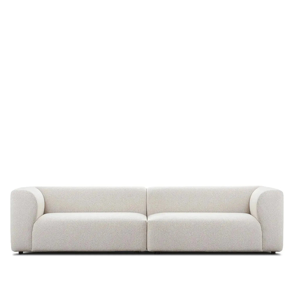 Minimalist fabric 4 seater sofa flower in white background.
