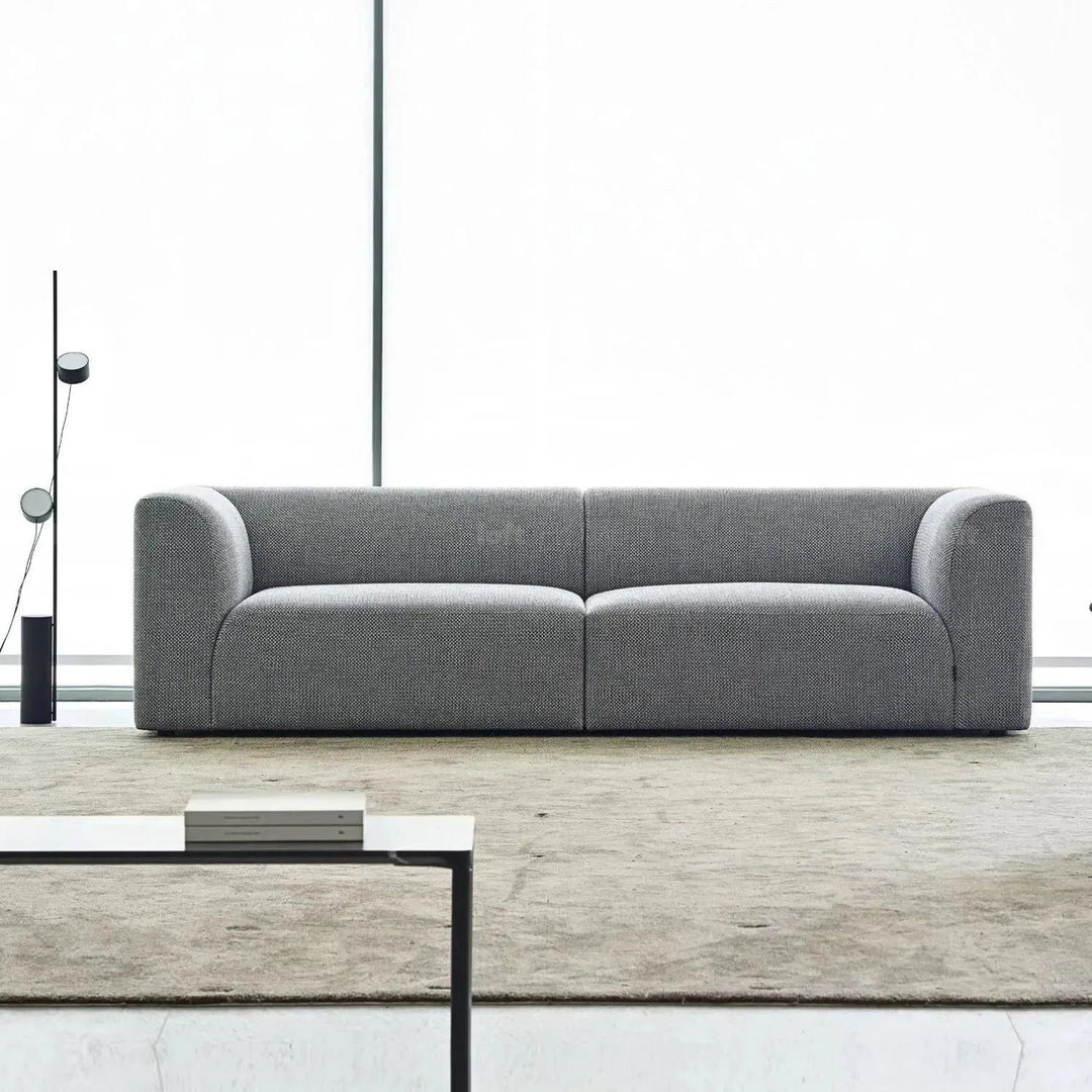 Minimalist fabric 4 seater sofa flower layered structure.
