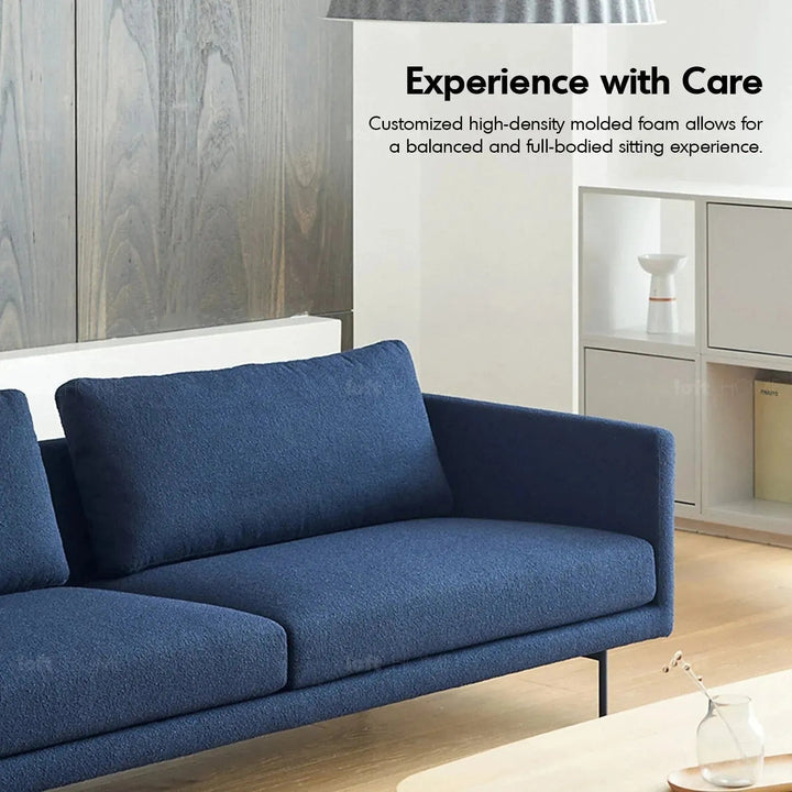 Minimalist fabric 4 seater sofa rina in panoramic view.