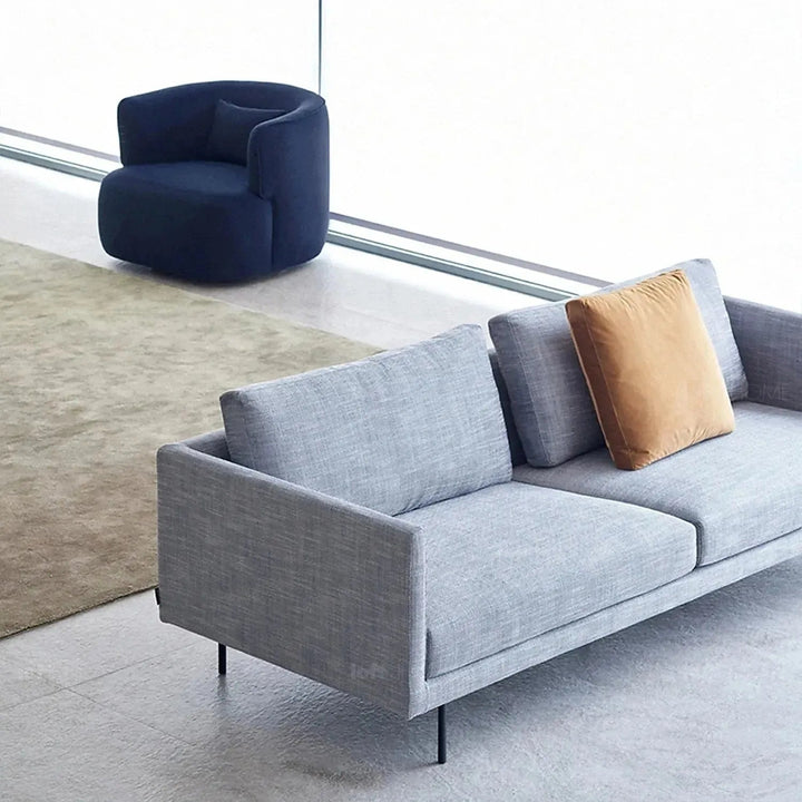 Minimalist fabric 4 seater sofa rina in still life.