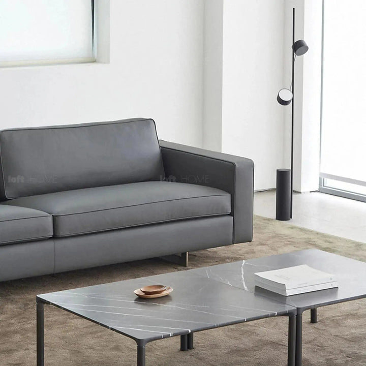 Minimalist fabric 4 seater sofa vemb in panoramic view.