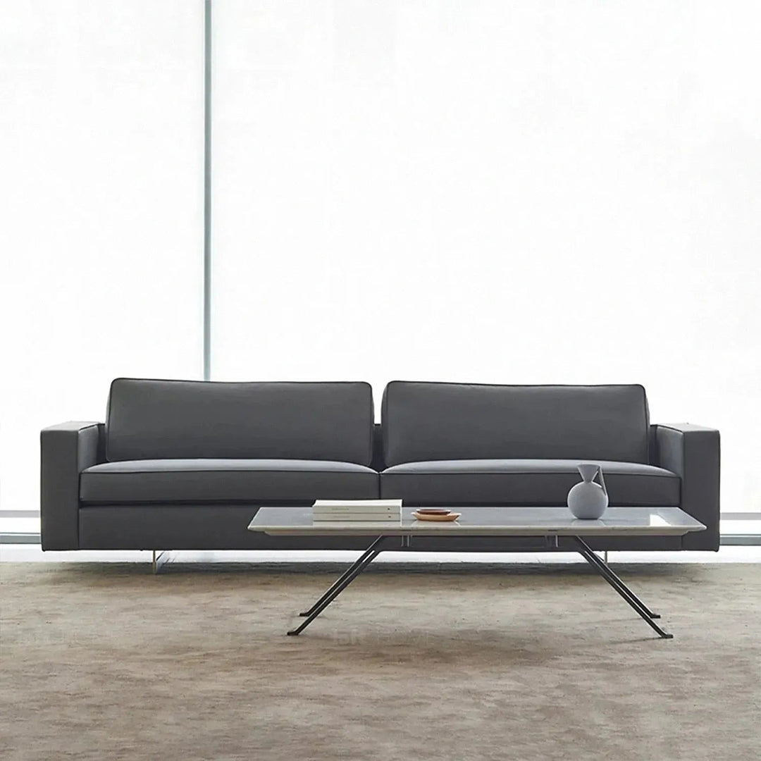 Minimalist fabric 4 seater sofa vemb in close up details.