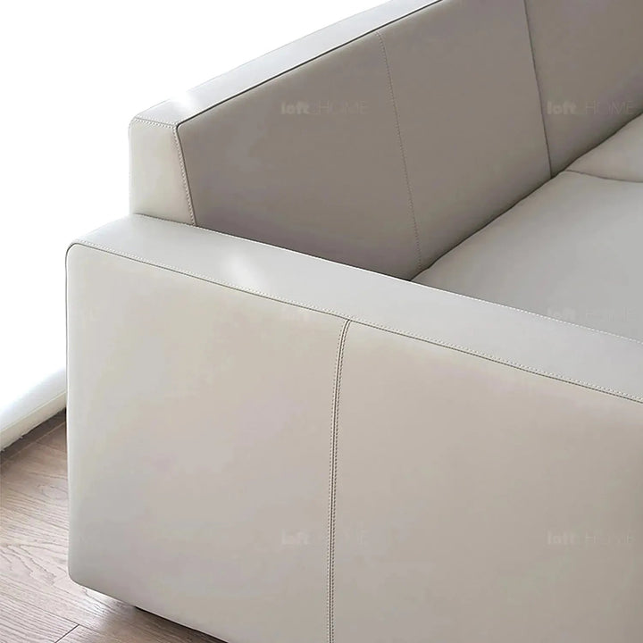 Minimalist fabric 4 seater sofa white in panoramic view.