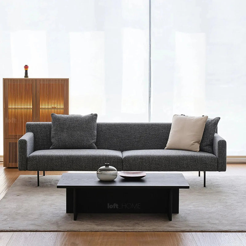 Minimalist fabric 4.5 seater sofa ann in still life.