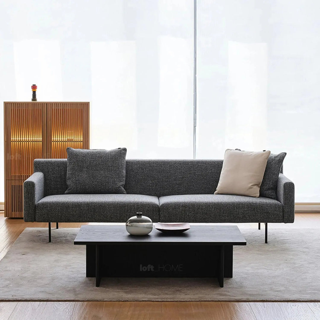 Minimalist fabric 4.5 seater sofa ann in still life.
