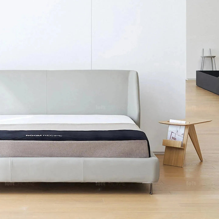 Minimalist fabric bed cygnus in still life.
