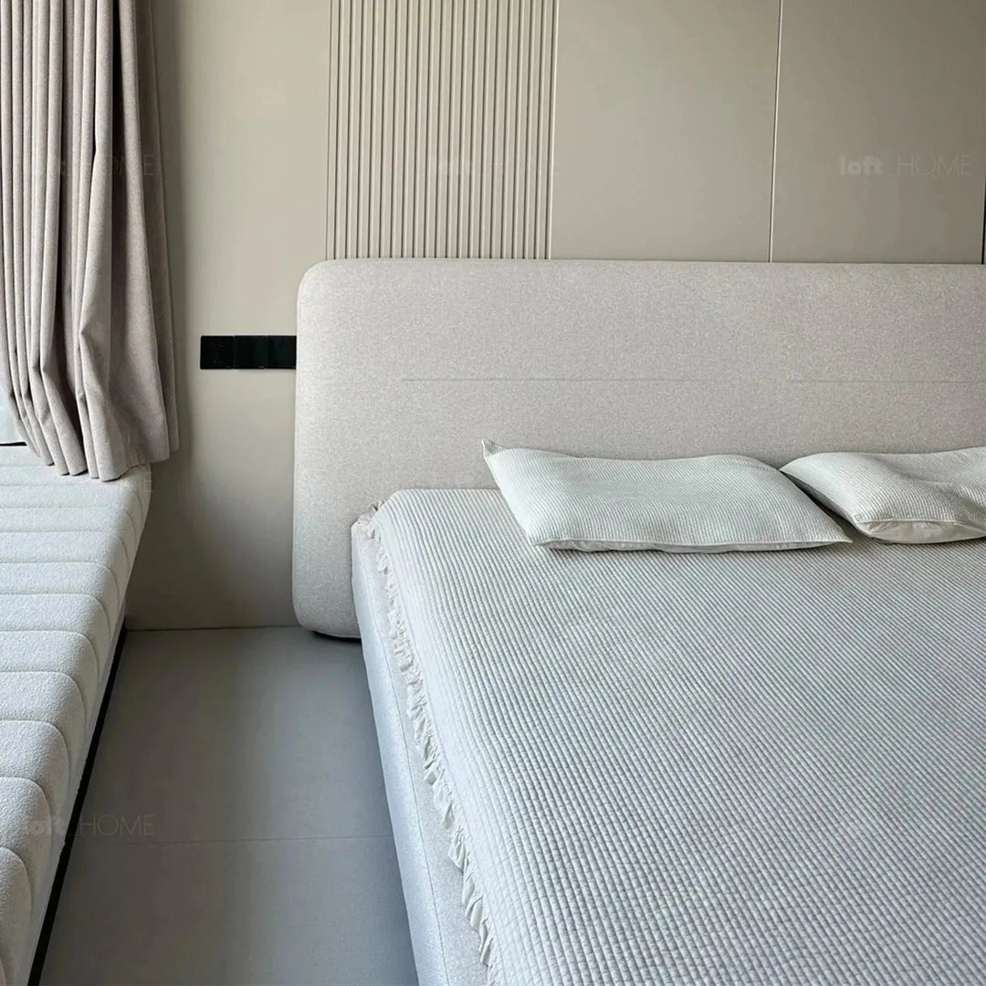Minimalist fabric bed hel environmental situation.