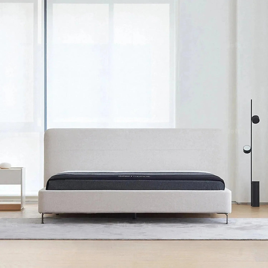 Minimalist fabric bed hel in details.