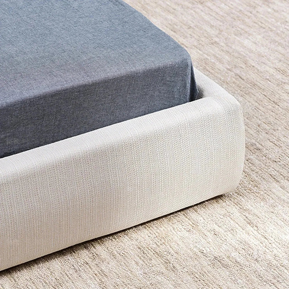 Minimalist fabric bed sino in still life.