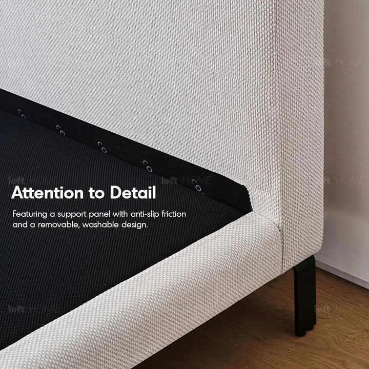 Minimalist fabric bed vem in close up details.