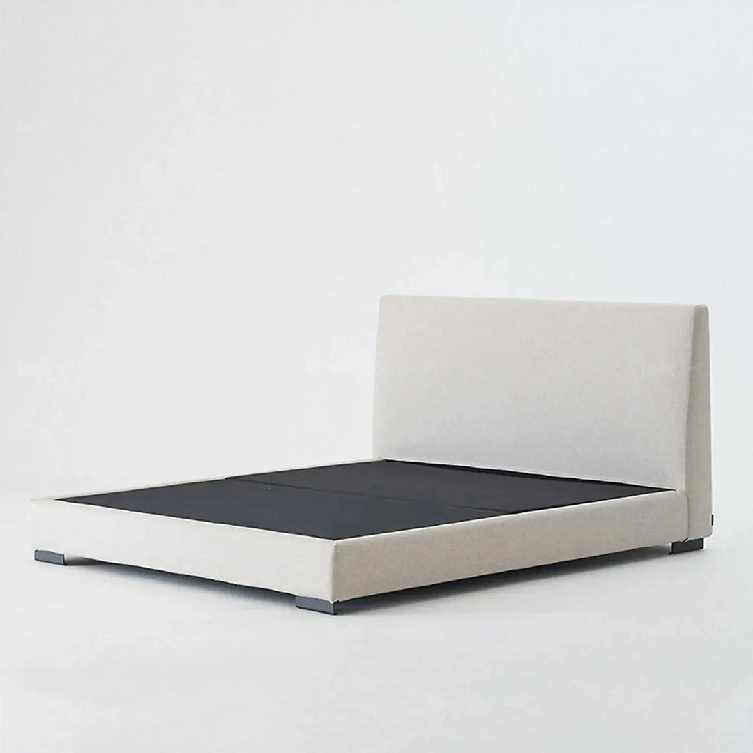 Minimalist fabric bed woods in still life.