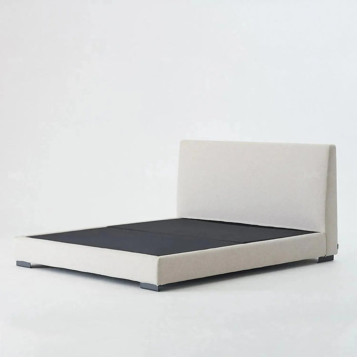 Minimalist fabric bed woods in still life.