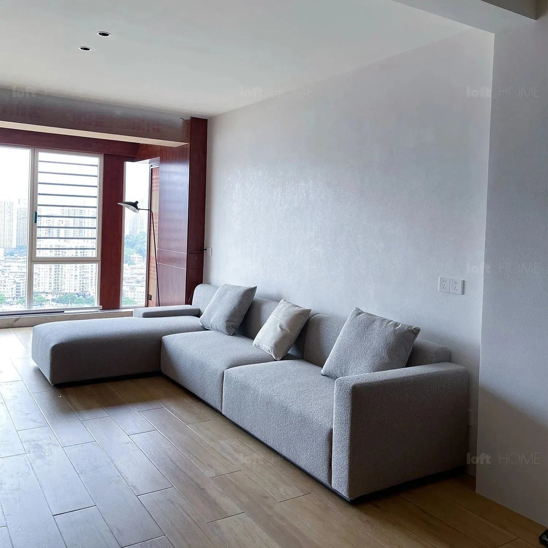 Minimalist fabric l shape sectional sofa nemo 2+l in close up details.
