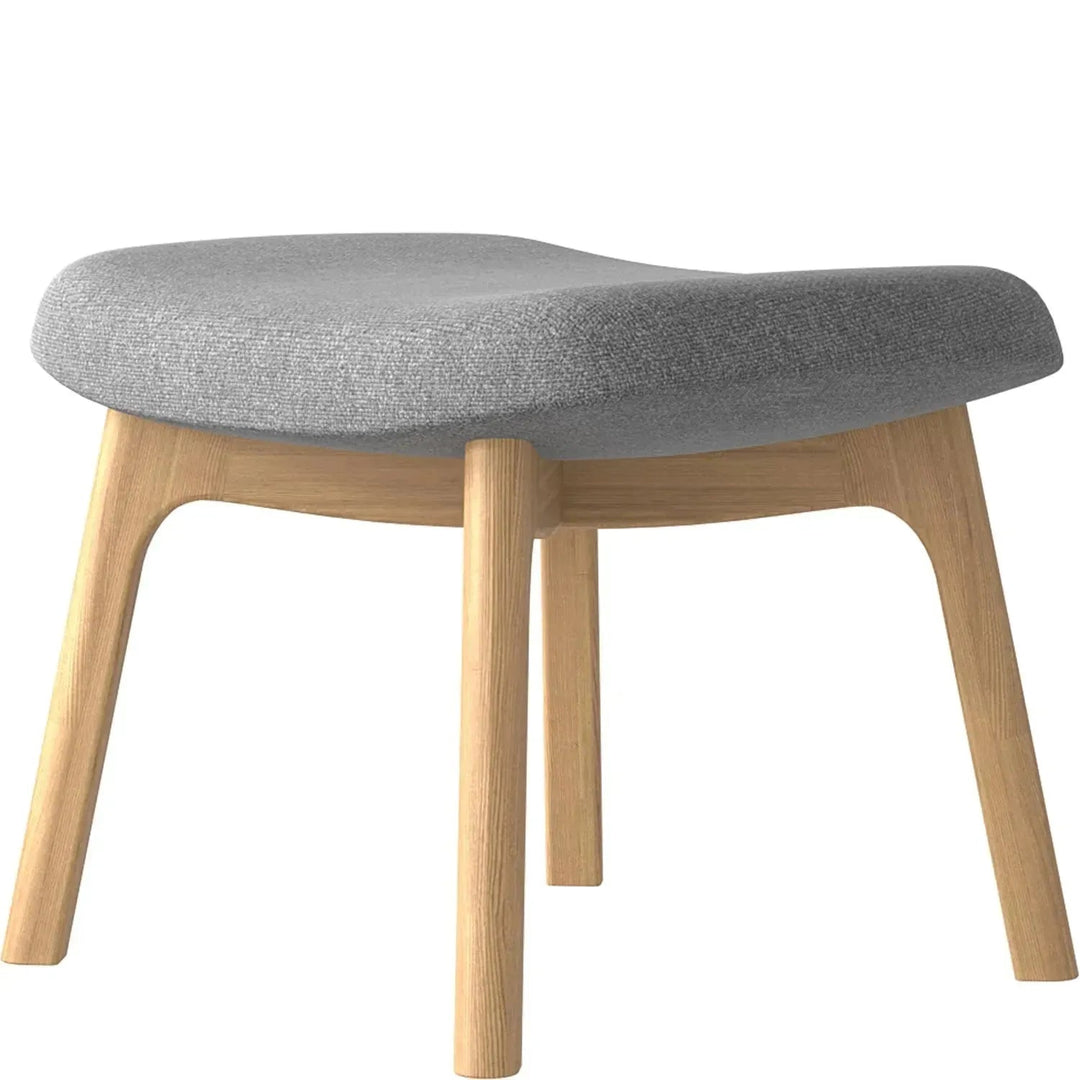 Scandinavian fabric ottoman sys with context.