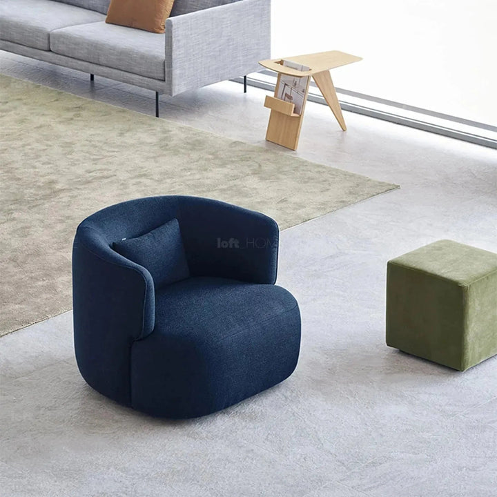 Minimalist fabric revolving 1 seater sofa heb situational feels.