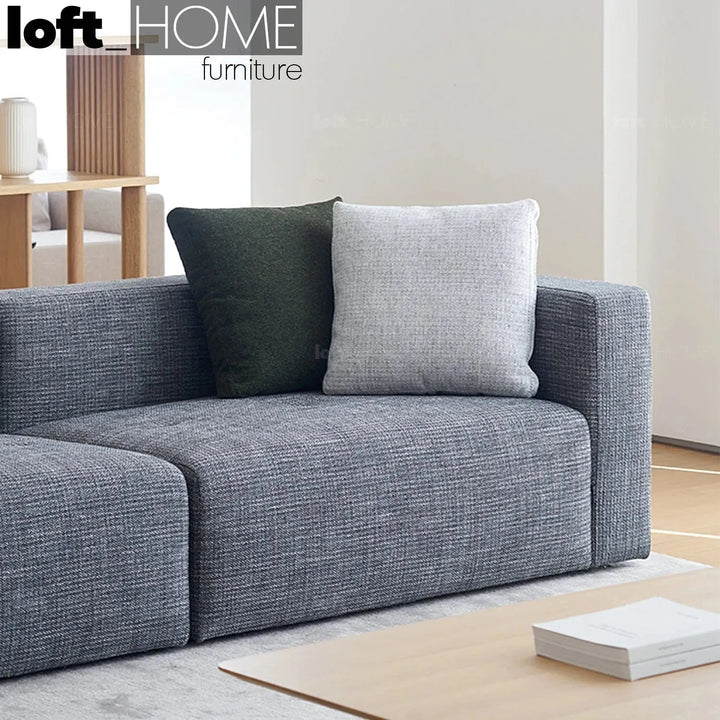 Minimalist fabric sofa pillow nor white primary product view.