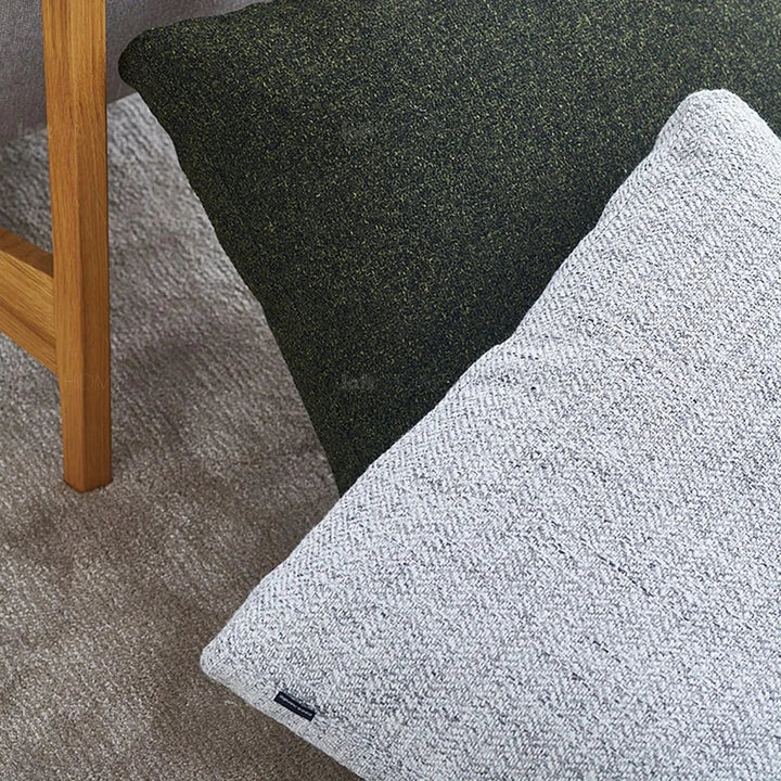 Minimalist fabric sofa pillow nor white color swatches.