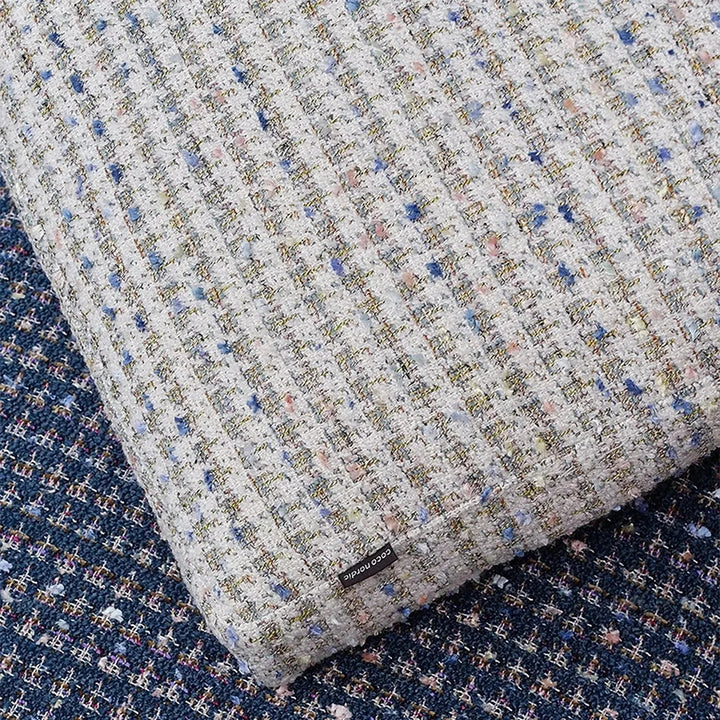 Scandinavian fabric sofa pillow pearl white color swatches.