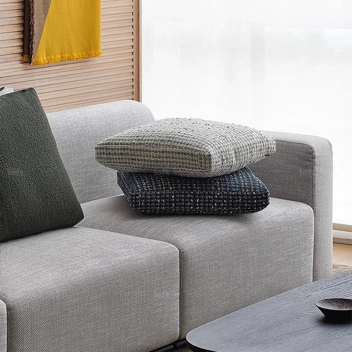 Scandinavian fabric sofa pillow pearl white material variants.