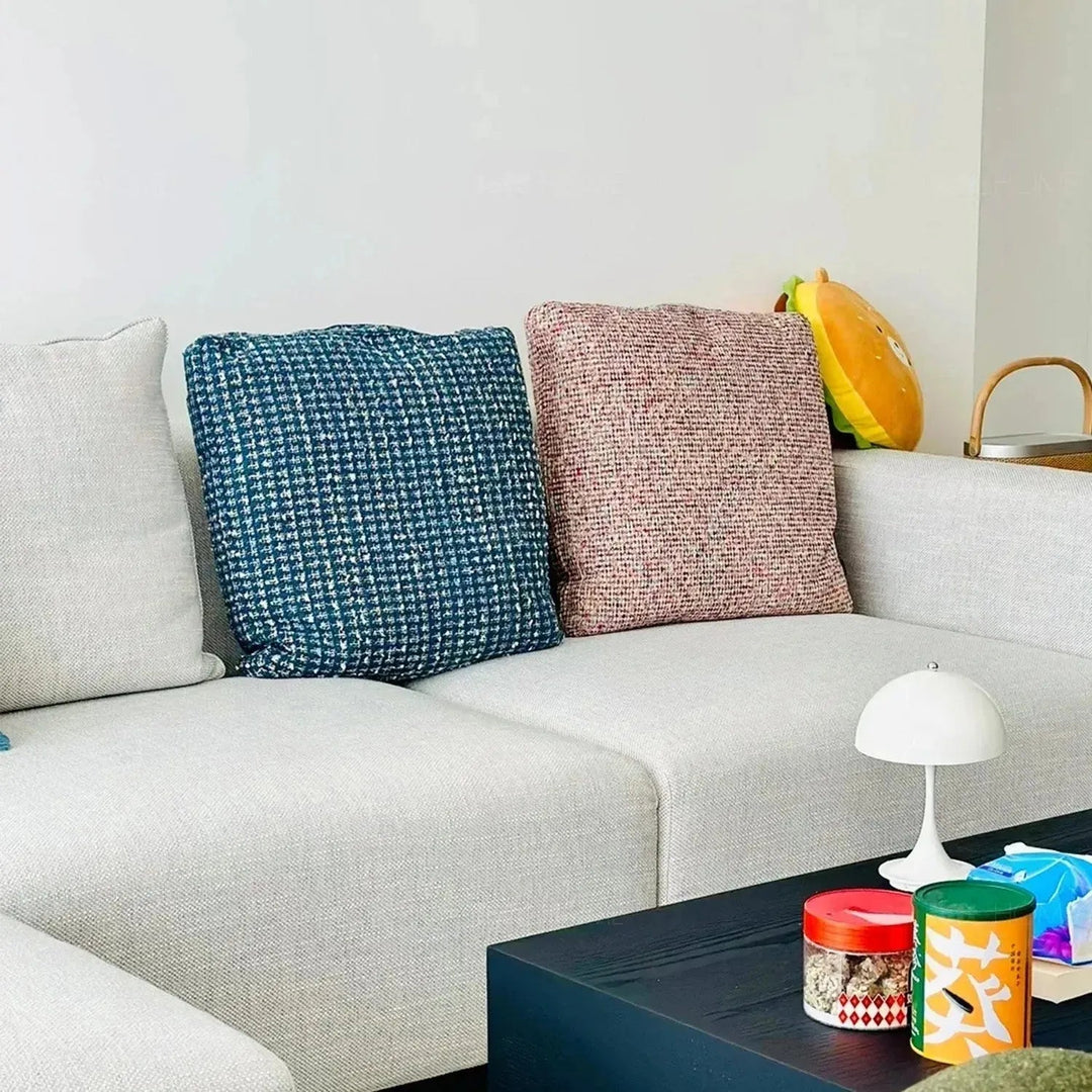 Modern fabric sofa pillow winter blue material variants.