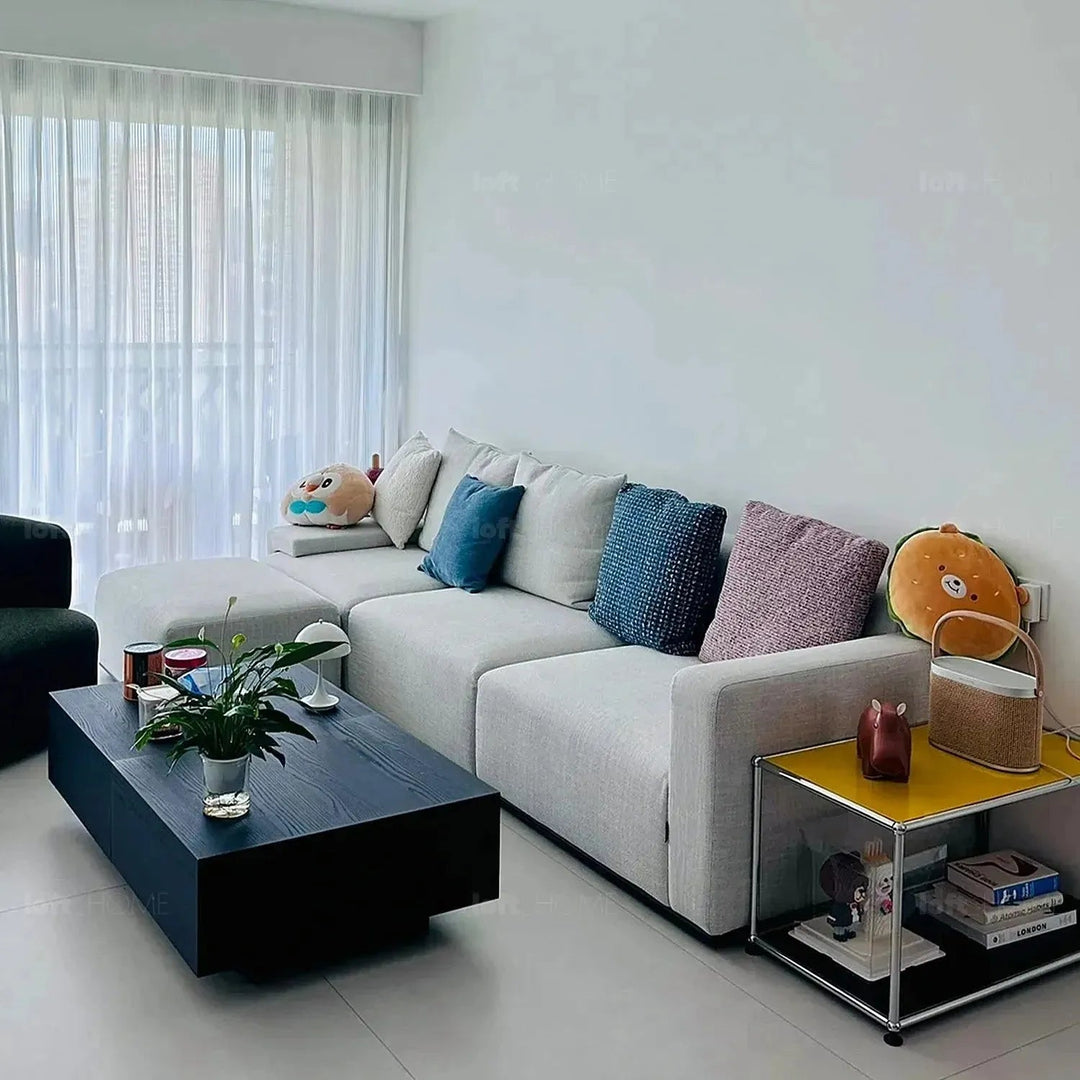 Modern fabric sofa pillow winter blue with context.