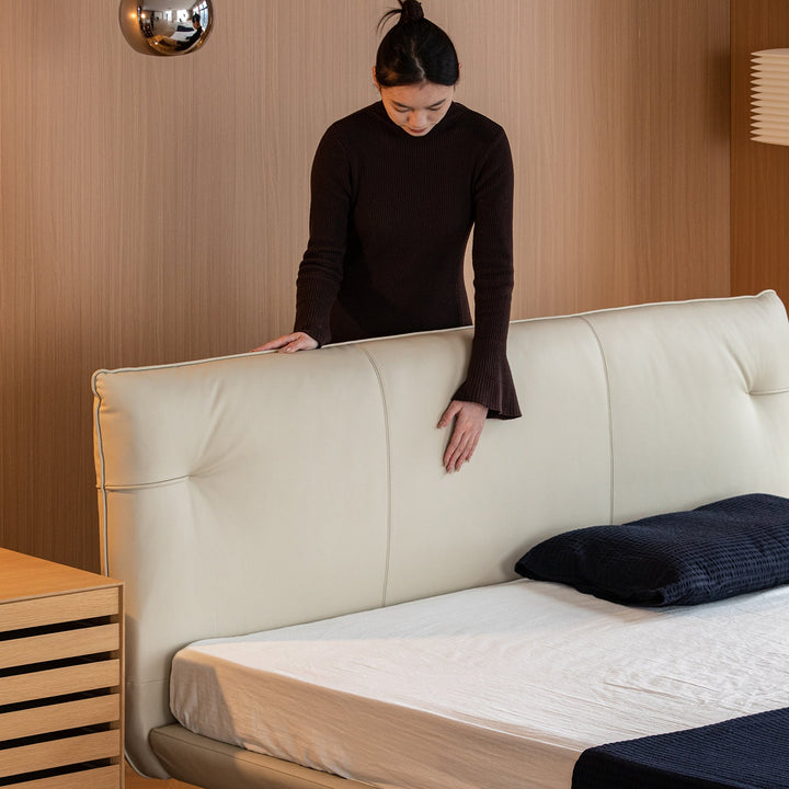 Minimalist genuine leather bed rhine with context.