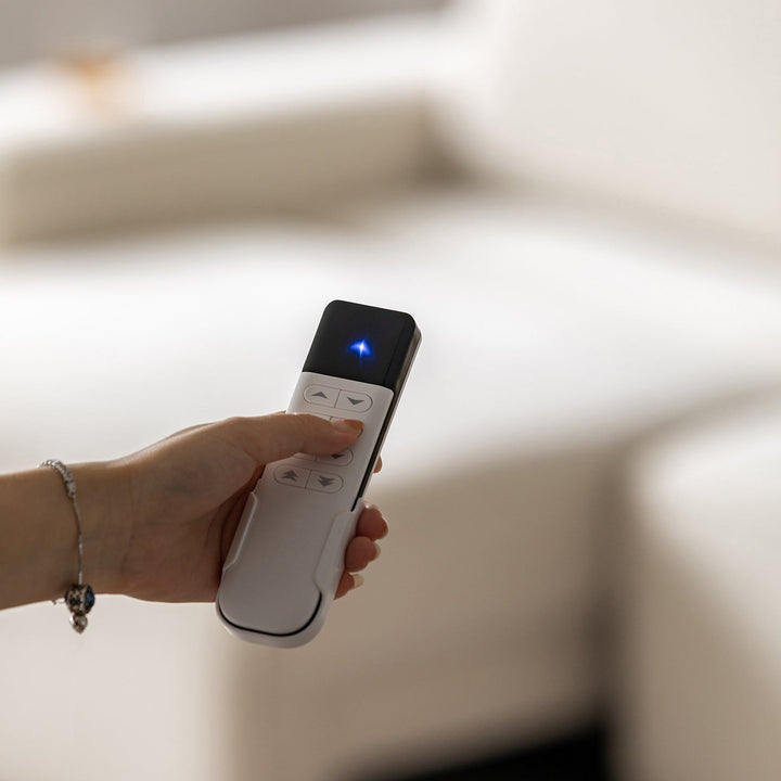 Minimalist genuine leather electric recliner 3 seater sofa bed string in panoramic view.