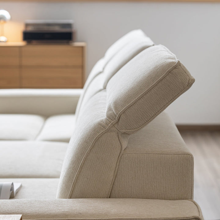 Minimalist genuine leather electric recliner 3 seater sofa bed string in close up details.